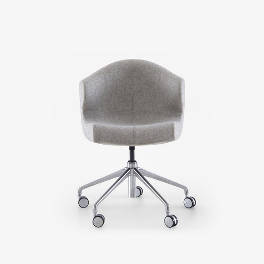 Alster carver fabric chair base on castors by Ligne Roset