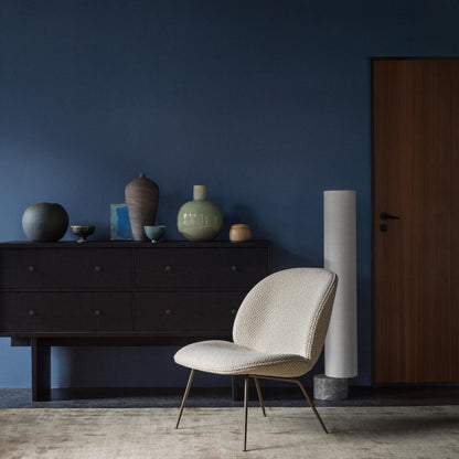 Beetle Armchair Dora Boucle With Legs In Antique Brass