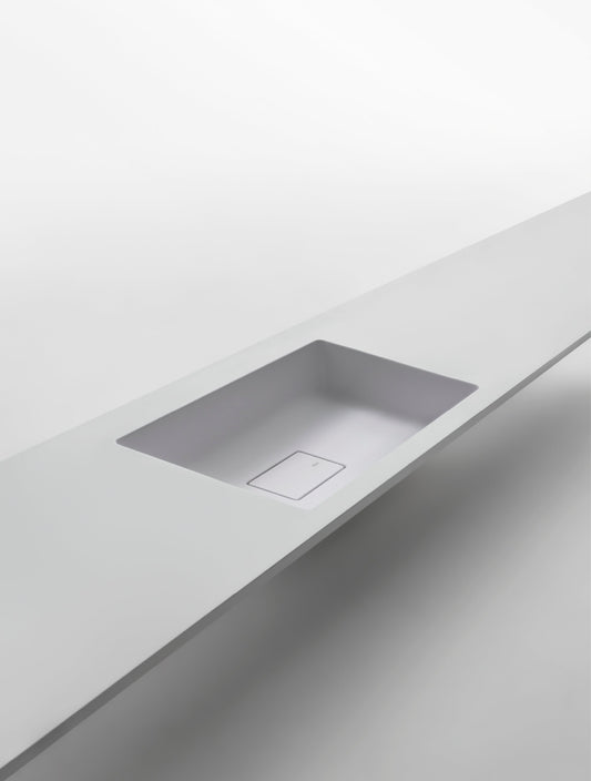 SHAPE H10 - Wall-mounted washbasin with integrated countertop by Falper