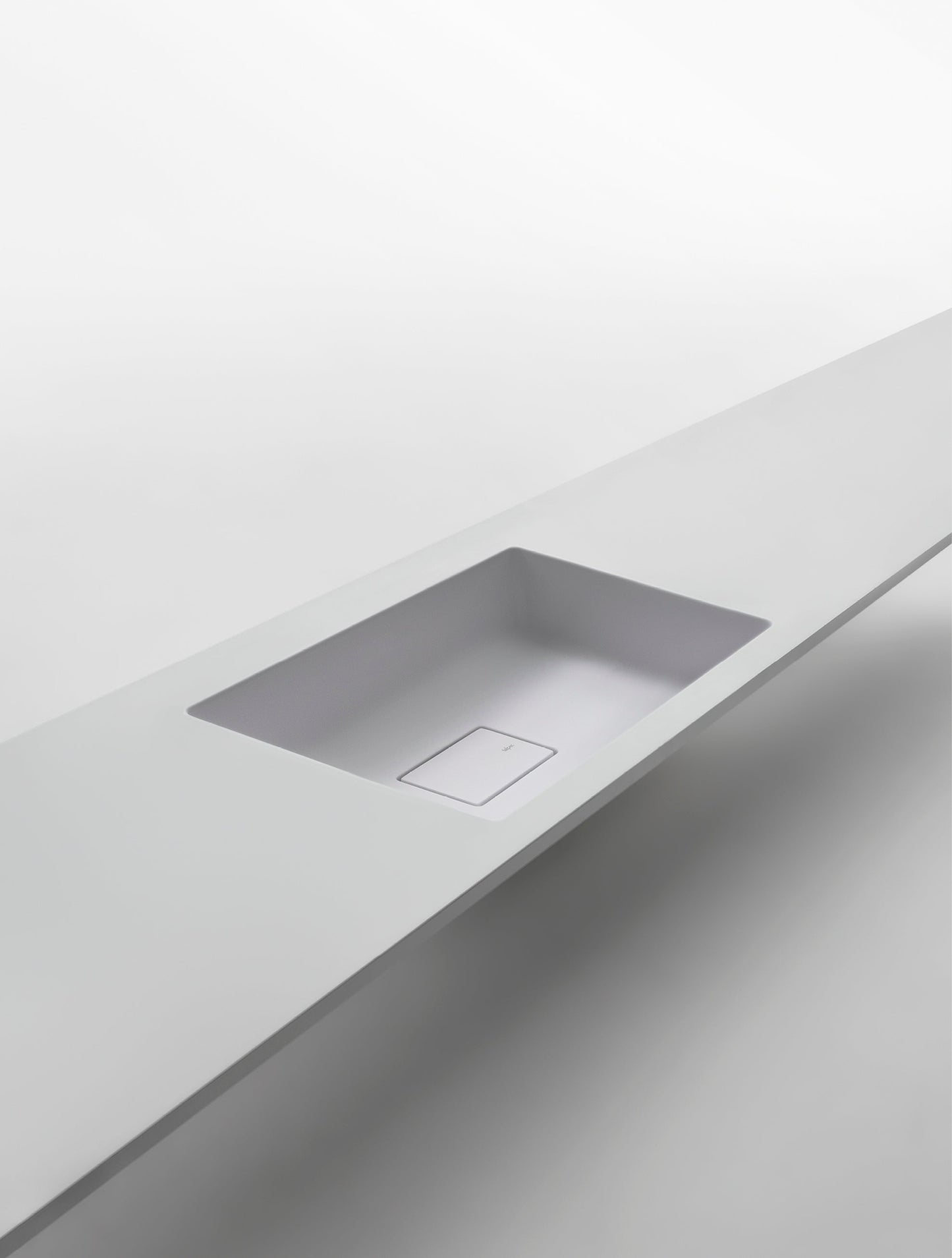 PURE - Washbasin with integrated countertop by Falper