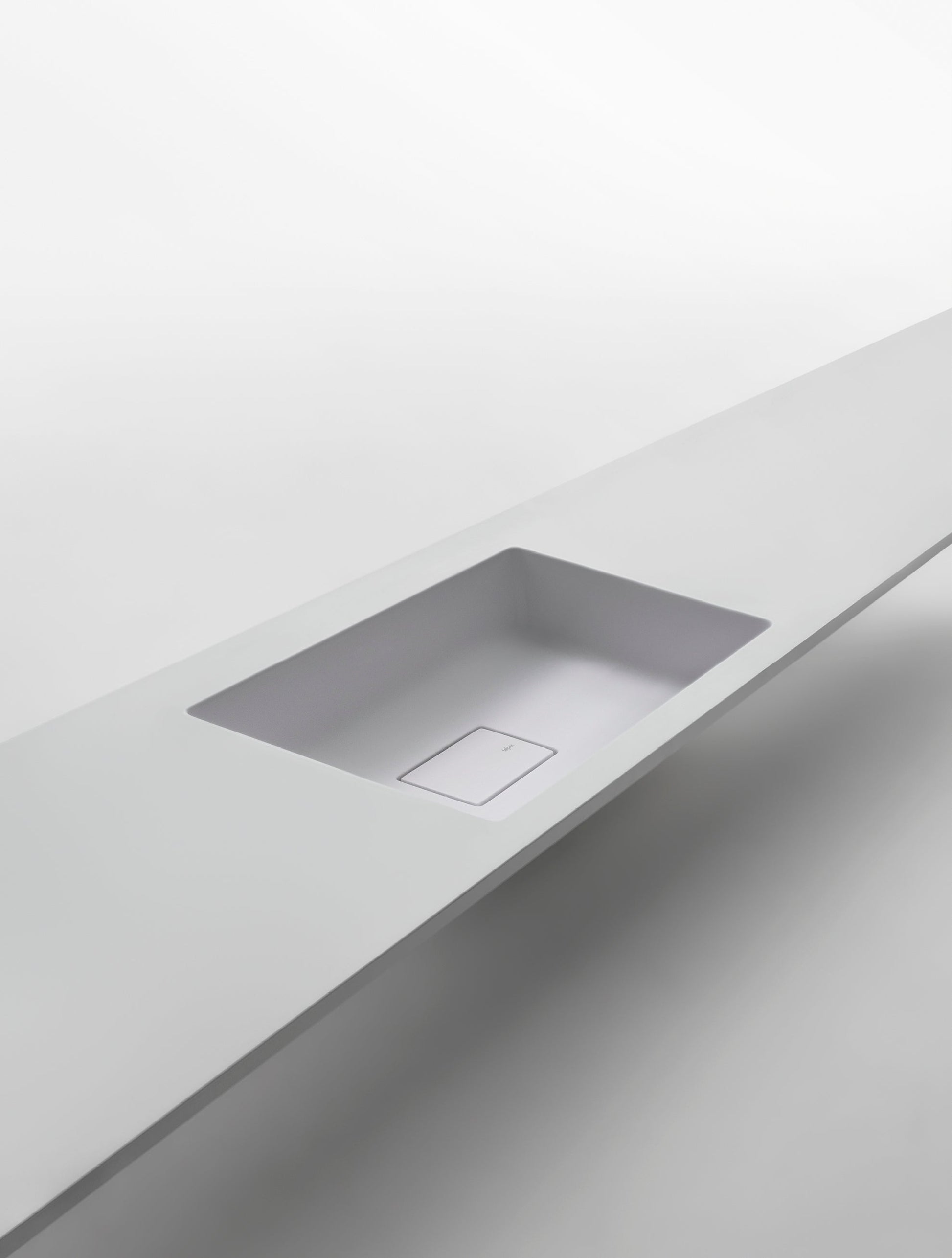 PURE - Washbasin with integrated countertop by Falper